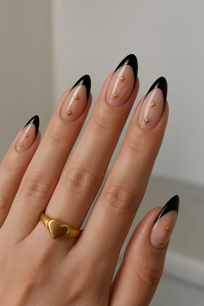 Black French Tip Nails with Gold Star Charms