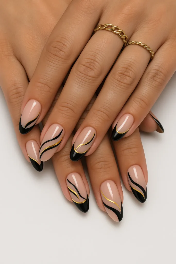 Elegant Gold & Black Swirl Nail Art